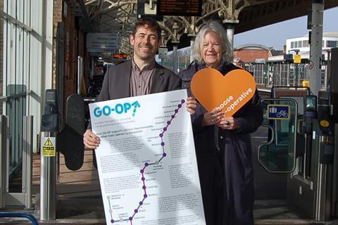 Go-op Alex Lawrie and Kate Whittle with map at Taunton station