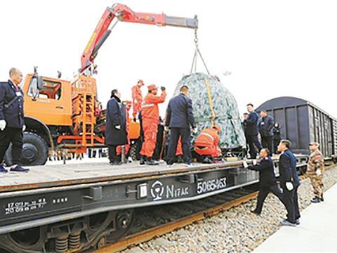 The Shenzhou 11 re-entry capsule from China’s sixth manned space mission was transported to Beijing by China Railway Corp.