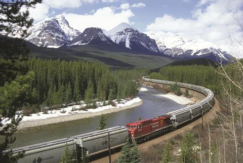 CP freight train and mountains in Canada