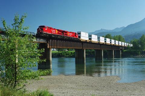 CP double-stack container freight train on a bridge in Canada (Photo Canadian Pacific)