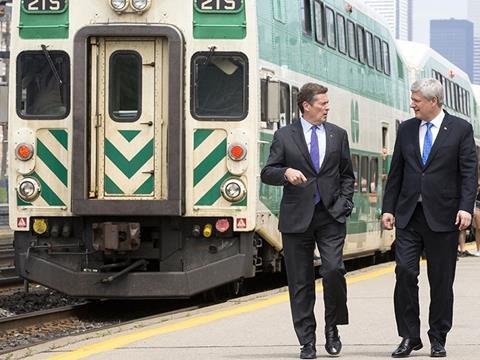 Prime Minister Stephen Harper (right) announced the funding, which is part of the SmartTrack plan of Mayor John Tory (left).