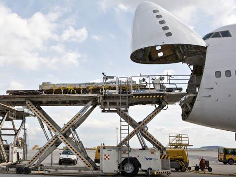 Trackcomponents being loaded on to IranAir Boeing 747 at Wien airport.