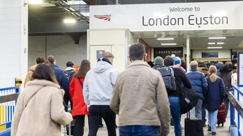 Passengers at London Euston station walking up the ramp from platforms to the concourse (Photo Network Rail)