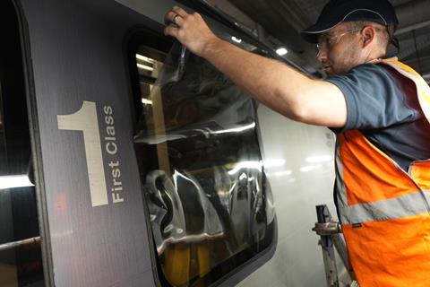 Window film being installed on a TPE train (Photo TPE)