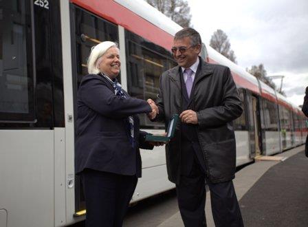 City of Edinburgh Council Leader Jenny Dawes receives the key to the first tram from Jesús Esnaola, CAF General Manager.