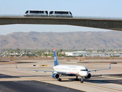 The Phoenix Sky Harbor airport peoplemover crosses an active taxiway.